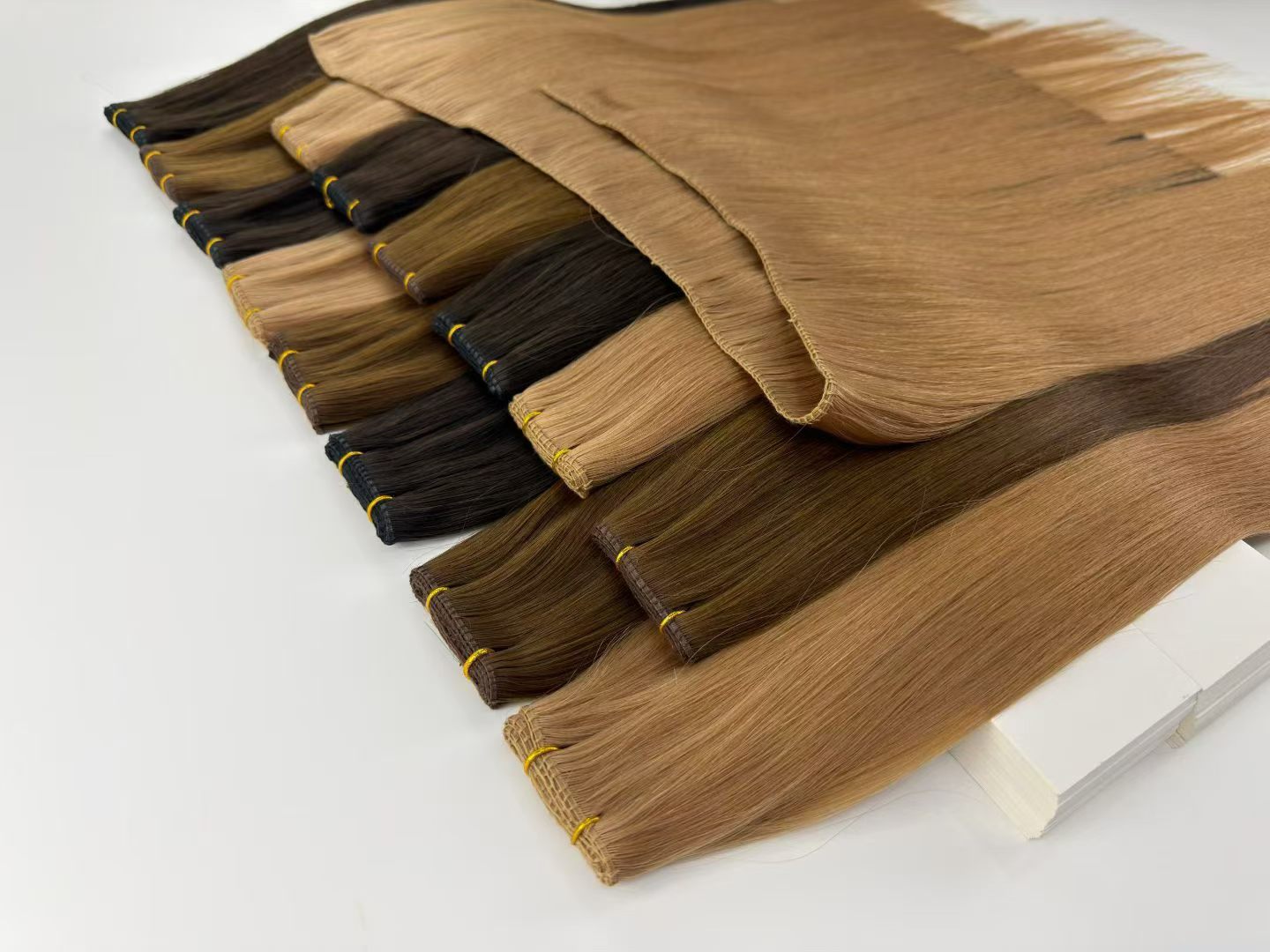 A considered selection of wefts in natural hair shades